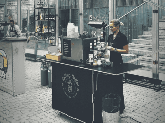 A fully customized mobile display cart showcasing various color options, modular shelving, and branded signage, demonstrating the wide range of customization possibilities for event vendors and retailers.